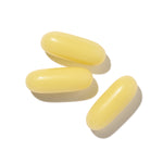 Three yellow capsules for enhanced glutathione absorption in the body.