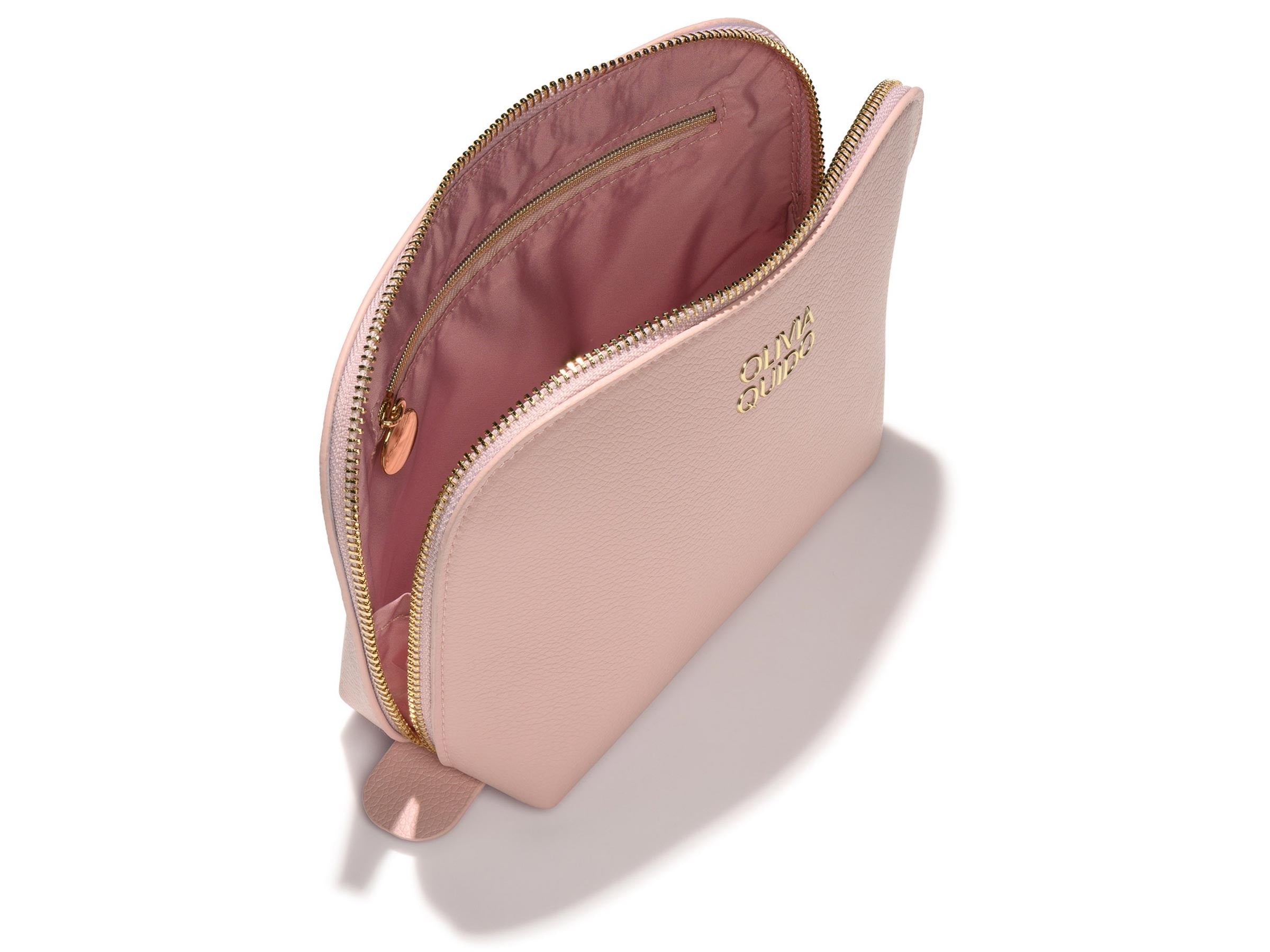 Olivia Quido Pink Faux Leather cosmetic bag on white background as part of the Skin Refining Set